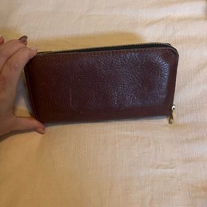 Portland Leather Zip Around Wallet Nutmeg is the color.
